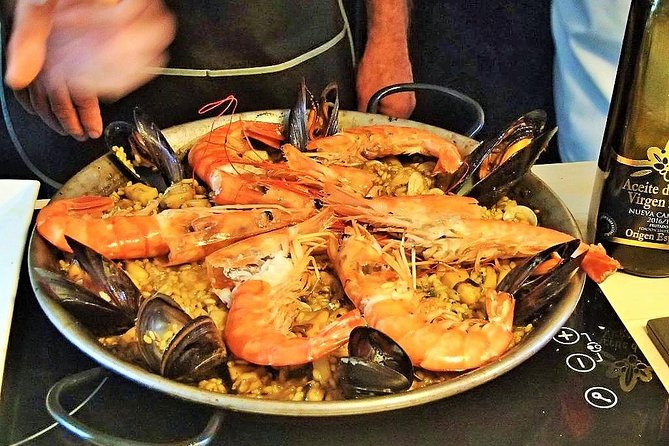 La Boqueria Market and Paella Cooking Class in Barcelona - Tapas tasting with wine: what you’re learning in each bite
