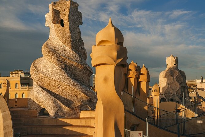 La Pedrera Guided Tour with Fast Track Access - La Pedrera’s Start Point: Stone, Courtyard Air, and Tiny Gaudí Details