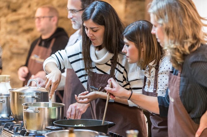Market Gourmet Visit and Spanish Culinary Experience in Barcelona - Price, group size, and the value of shared participation