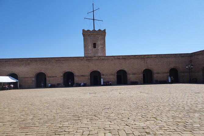 Montjuic Castle Admission Ticket in Barcelona - Grounds, gardens, and the practical route up (tram, cable car, and walking)