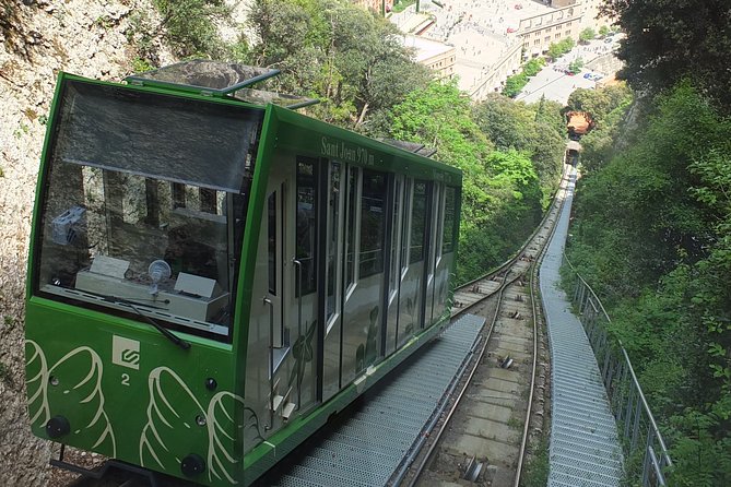 Montserrat Guided Tour with Cogwheel or Cable Car & Black Madonna - Santa Maria de Montserrat Abbey: the 40-minute anchor
