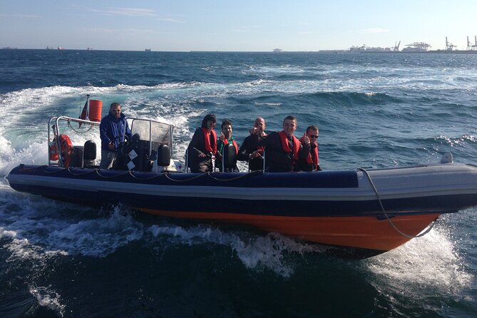 One-hour High-Speed Powerboat Ride - Port Vell: Superyachts, Team Bases, and the Columbus Moment
