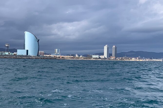 Private sailing and paddlesurfing tour with skipper up to 11 people - Stop 3: Port Vell (Old Port) and the Dockside Photo Perspective