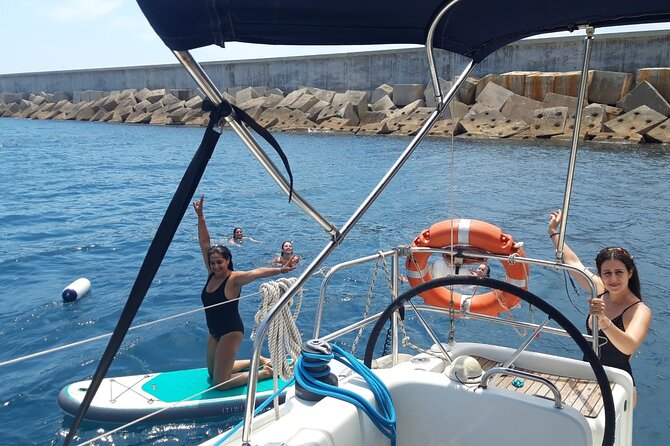 Private sailing and paddlesurfing tour with skipper up to 11 people - Stop 6: Bogatell Beach and the View-From-Below Feel