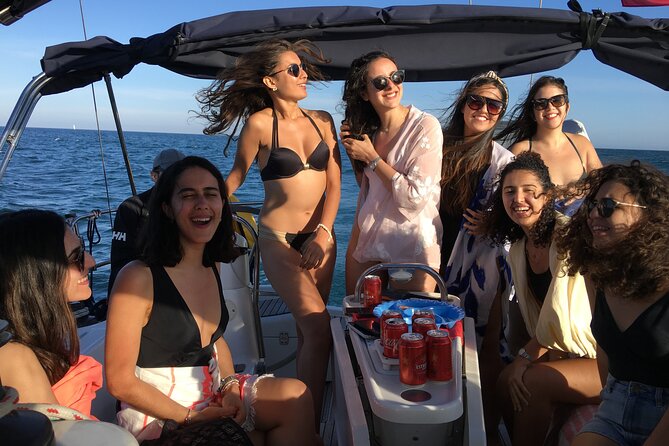 Private sailing trip from Barcelona with open bar - Your onboard rhythm: snacks, Bluetooth music, and skyline time