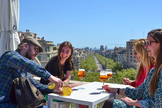 Private Ultimate Gaudi Legacy ebike Tour with Park Güell - A break at Alaire Rooftop Bar: included drink, city-level views