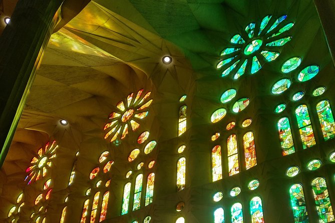 Sagrada Familia Guided Tour with Towers Access - Tower access: elevator up, stairs down, and the best photo angles