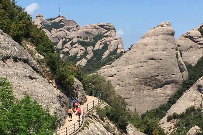 Semi-Private Montserrat Monastery, Funicular & Scenic Nature Walk - Inside Abadia de Montserrat: Basilica Santa Maria and monastic life