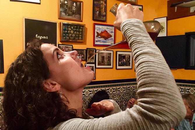Sip, Sites & Bites Barcelona Food, Drinks & History Tour - Stop 1: La Barceloneta—family bar, two traditional dishes, and Cava to start
