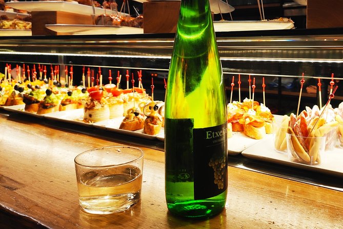 Spanish Wine and Tapas Tour in a Local Neighborhood in Barcelona - Four bar stops, 8 to 12 tapas flavors, and wine that actually teaches you