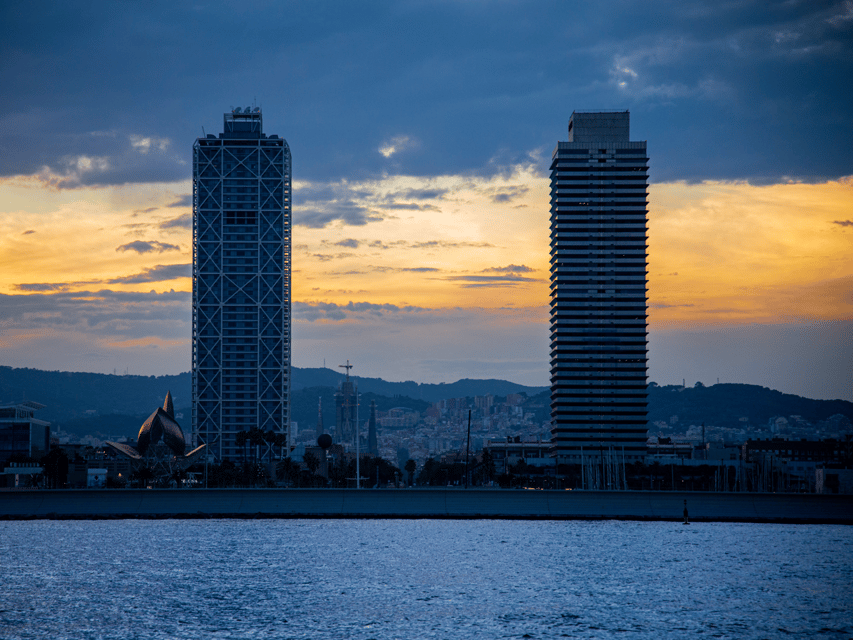 Sunset Sailing Experience in Barcelona - Swimming stop: cool water, sunset colors, and practical comfort