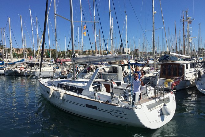 Wonderful 2 Hour Sailing trip including open bar and Pinchos - Leaving Port Vell: Where Barcelona’s Ships and Ferries Fly Past