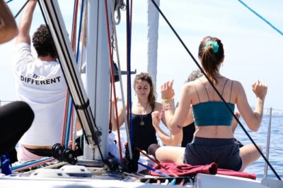 Yoga Session and Sailing Adventure in Barcelona - Barcelona from afar: monuments and beach passes on a moving boat
